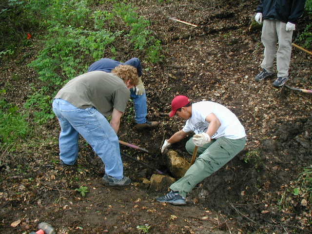 Jonah Berger, Robert Farmer and Davis removing a rock for the culvert (1)