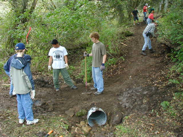 Randy, Robert, Davis and Jonah - partially completed culvert