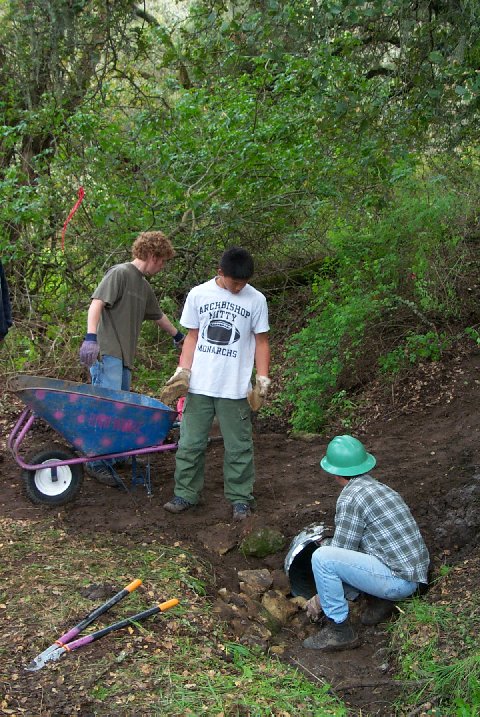 Riprapping the culvert - Jonah, Davis and Dave C. (photo: Tim Oren)